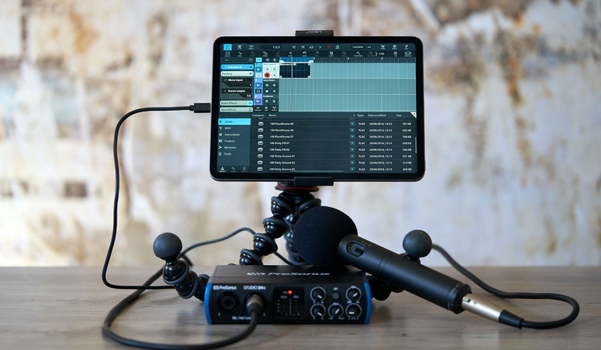 iPad on tripod connected to an audio interface and microphone